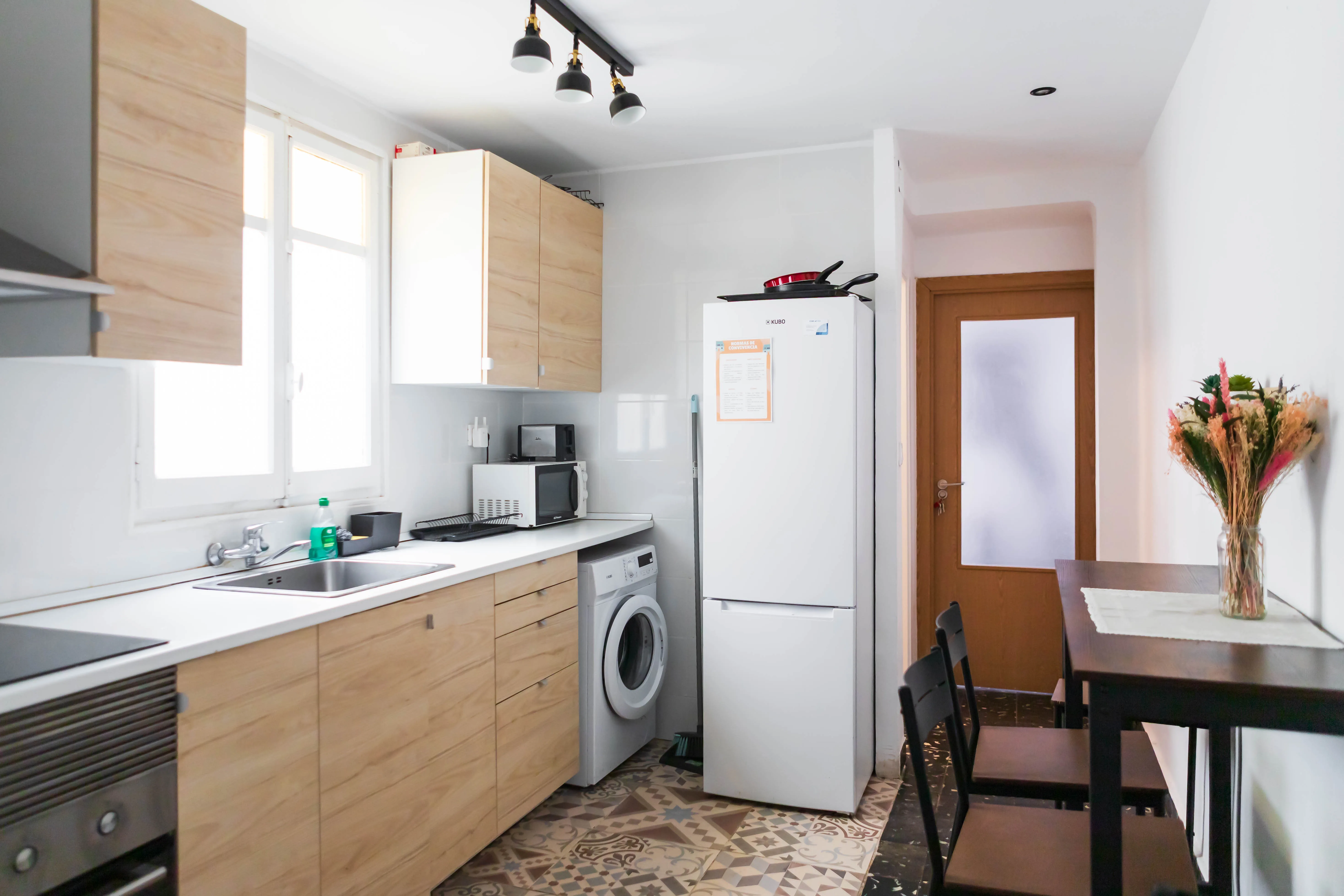 Cocina reformada de vivienda habitual con distribución funcional